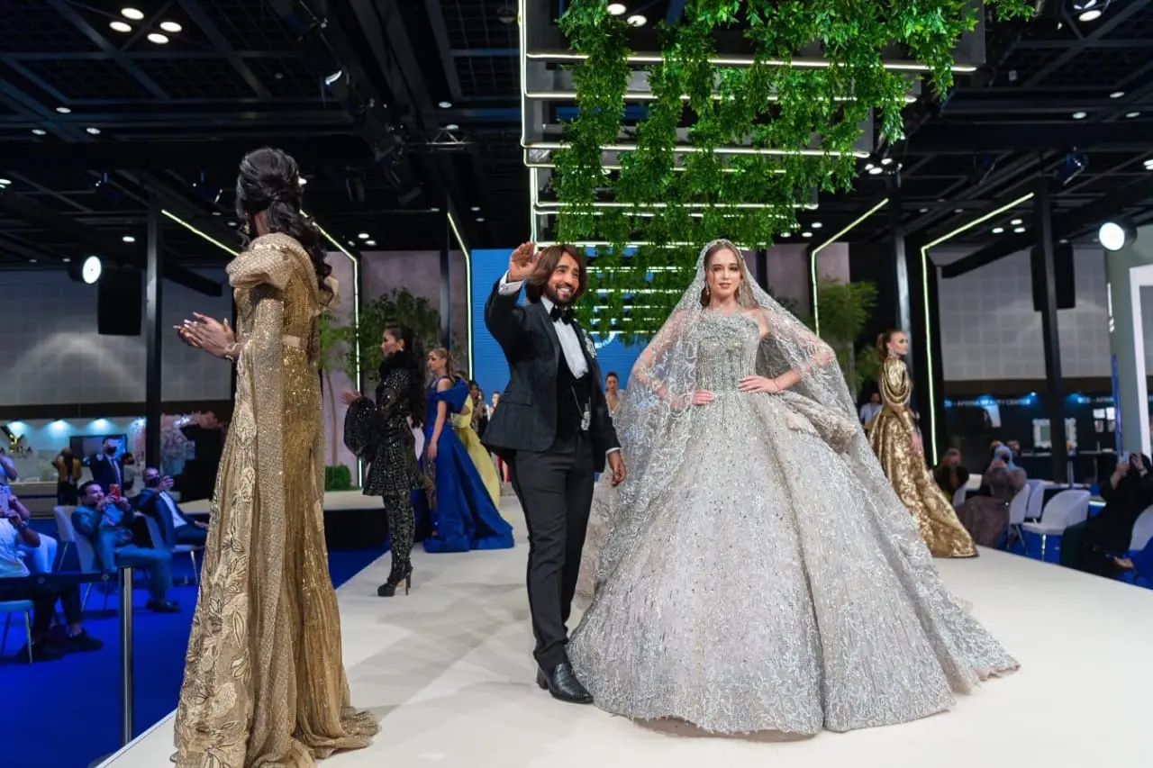 Silver haute couture bridal dress on runway