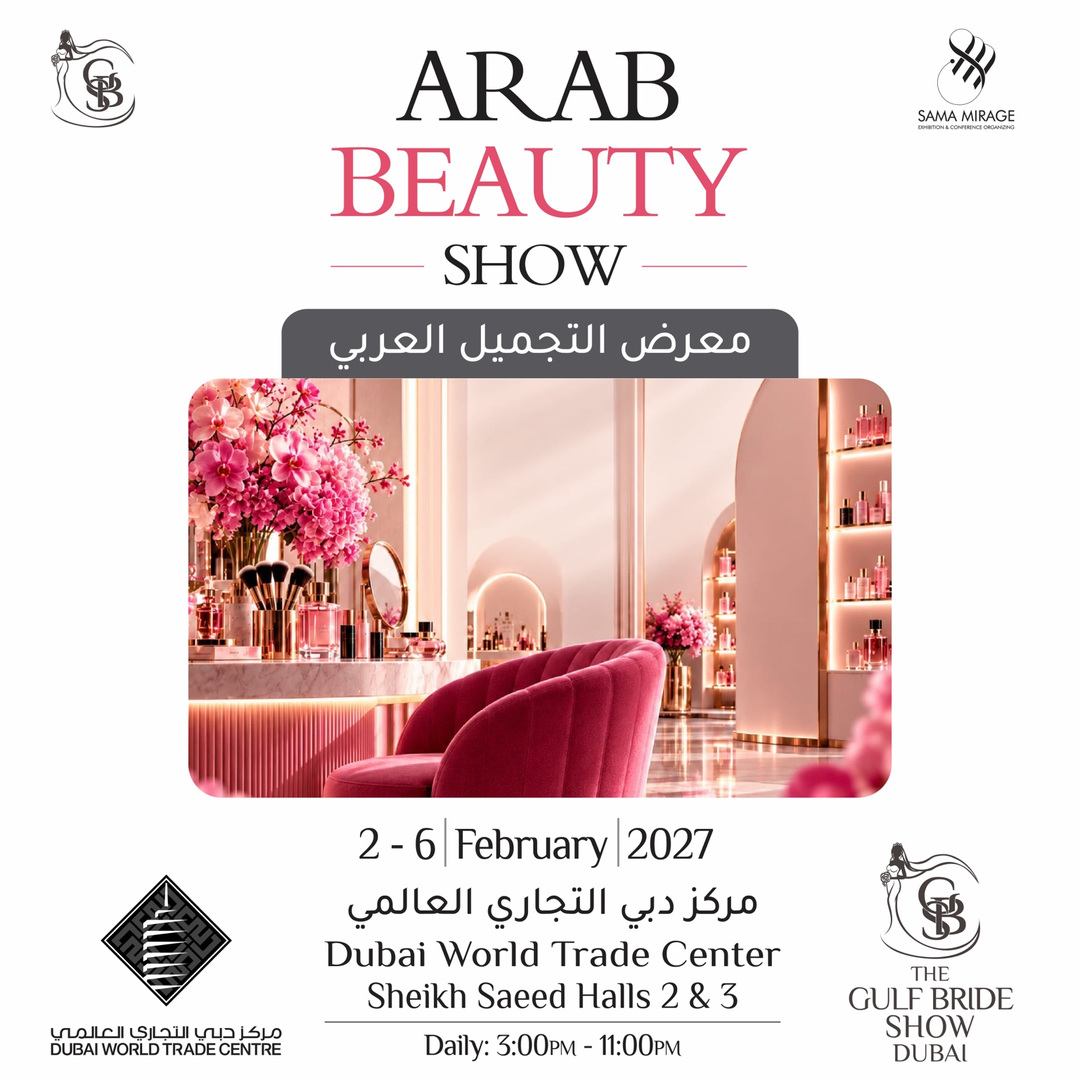 Pink marble beauty vanity with orchids, perfume, brass mirror, magenta velvet chair and arched niches for the Arab Beauty Show Dubai 2027